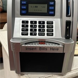 Silver and Black Bill Acceptor Machine